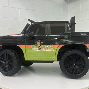 Miniature car with Big Frog custom branding and vibrant green and orange design, ideal for promotional displays.